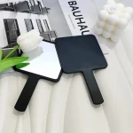 INS 블랙 핸드 헬드 미러 메이크업 거울 휴대용 화장품 거울 학생 휴대용 핸들 미러 여행 작은 주머니 - 이미지 2