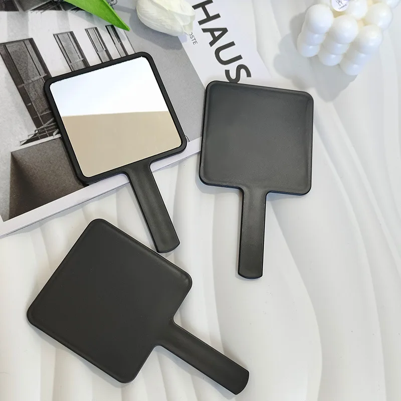 INS 블랙 핸드 헬드 미러 메이크업 거울 휴대용 화장품 거울 학생 휴대용 핸들 미러 여행 작은 주머니